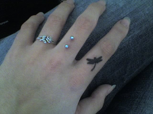 Retsis tattoo on my finger - dragonfly tattoo