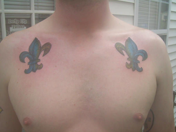 Fleur De Lis on Chest - chest tattoo