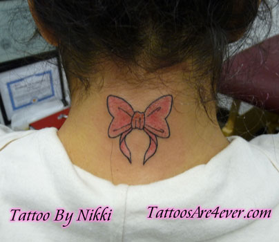 tribal tattoos arm_14. pink bow tattoos. ow tattoos