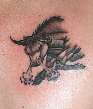 bull tattoo - chest tattoo