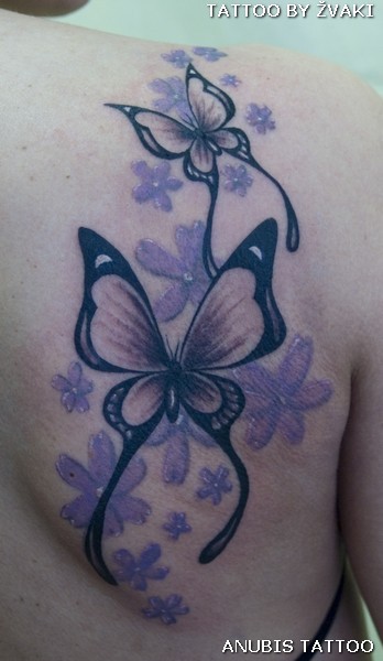 anubis tattoo. butterfly tattoo by