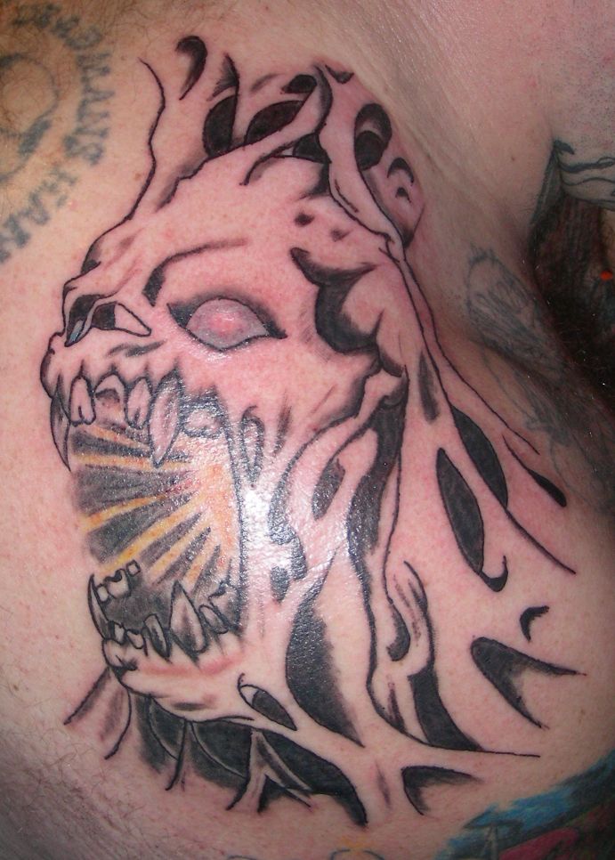 howards right shoulder - shoulder tattoo