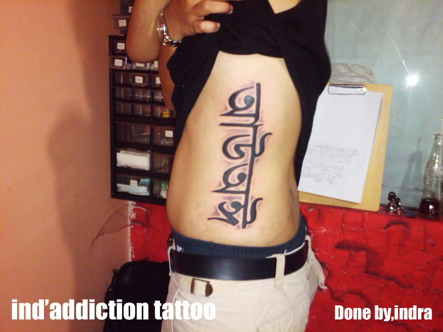 hindi tattoos. letter ribs tattoo,hindi