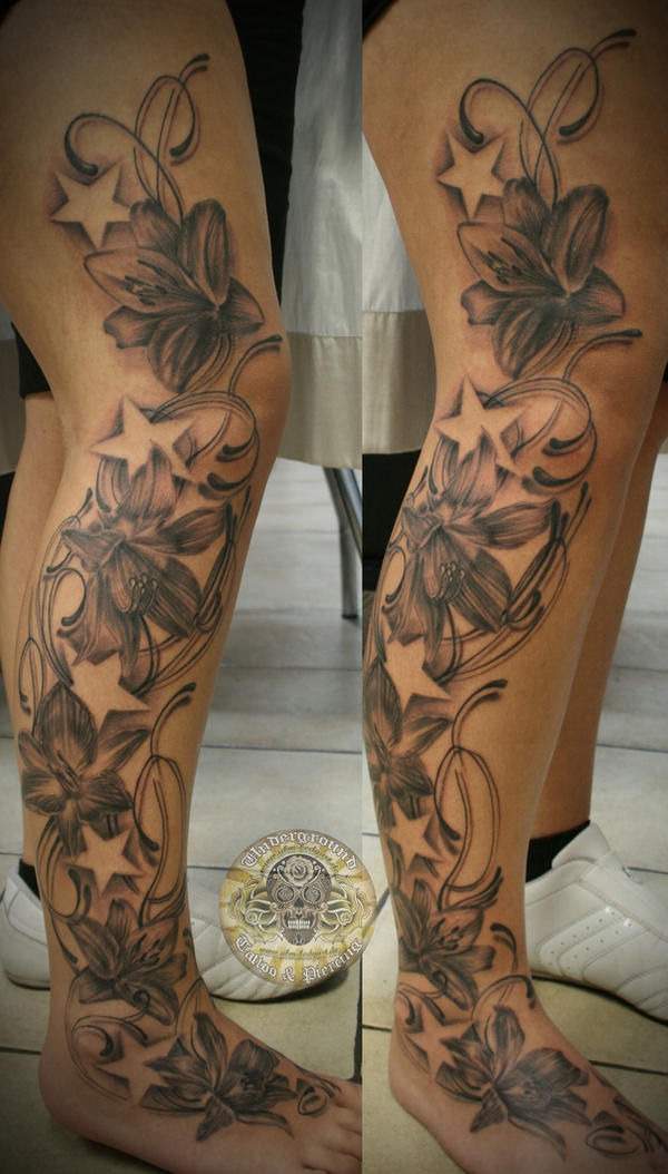 flower tattoo with stars. flower tattoos for girls