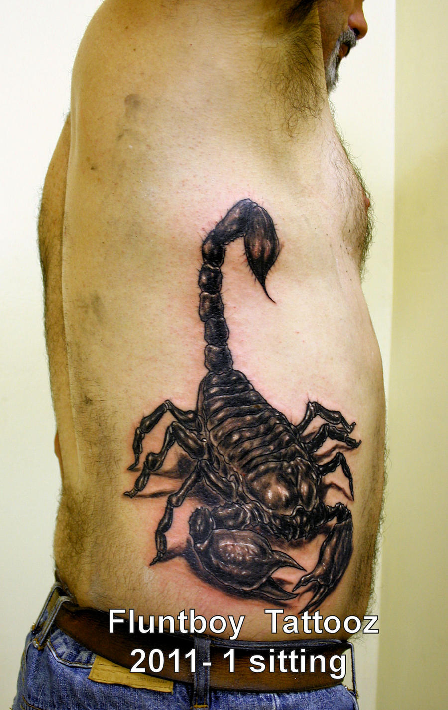 Scorpion Rib Tattoo by