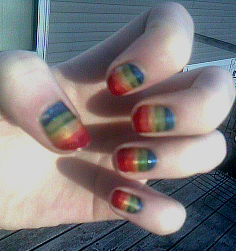 http://fc07.deviantart.net/fs71/f/2010/233/6/5/rainbow_nails_by_hxcvisionary.jpg