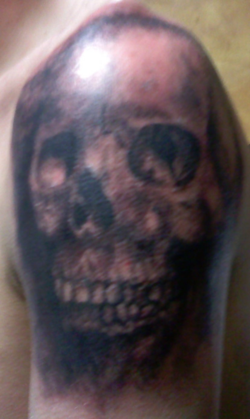 tattoo skull by Virtuegunn on