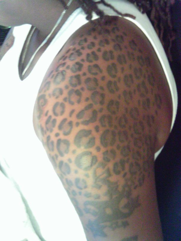 cheetah print tattoo. animal print cheetah beauty