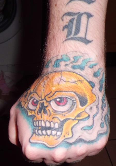 Hand Skull tattoo by